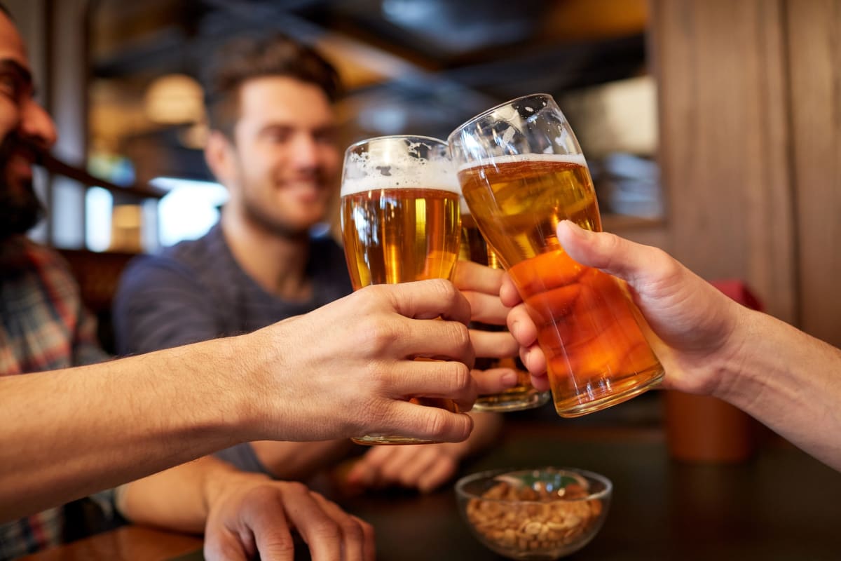 A group of guys enjoying a pint