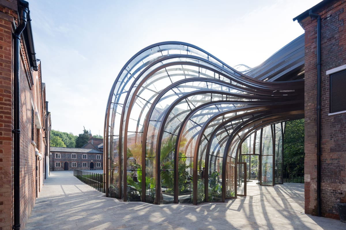 View of the tropical glasshouse to the courtyard.jpg