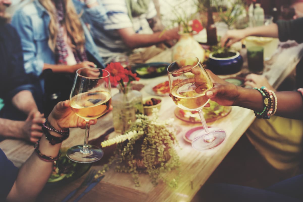 A group of people eating at a restaurant