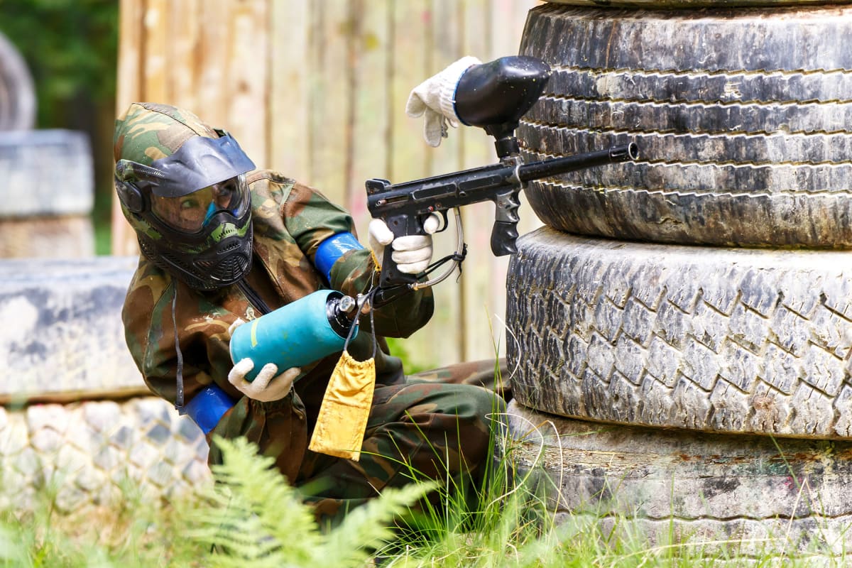 A group of people enjoying a game of paintball