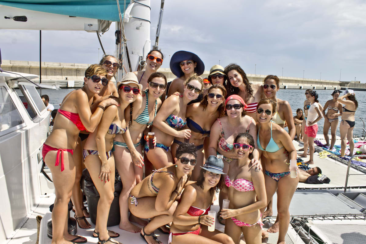 An attractive hen group celebrating on a party boat