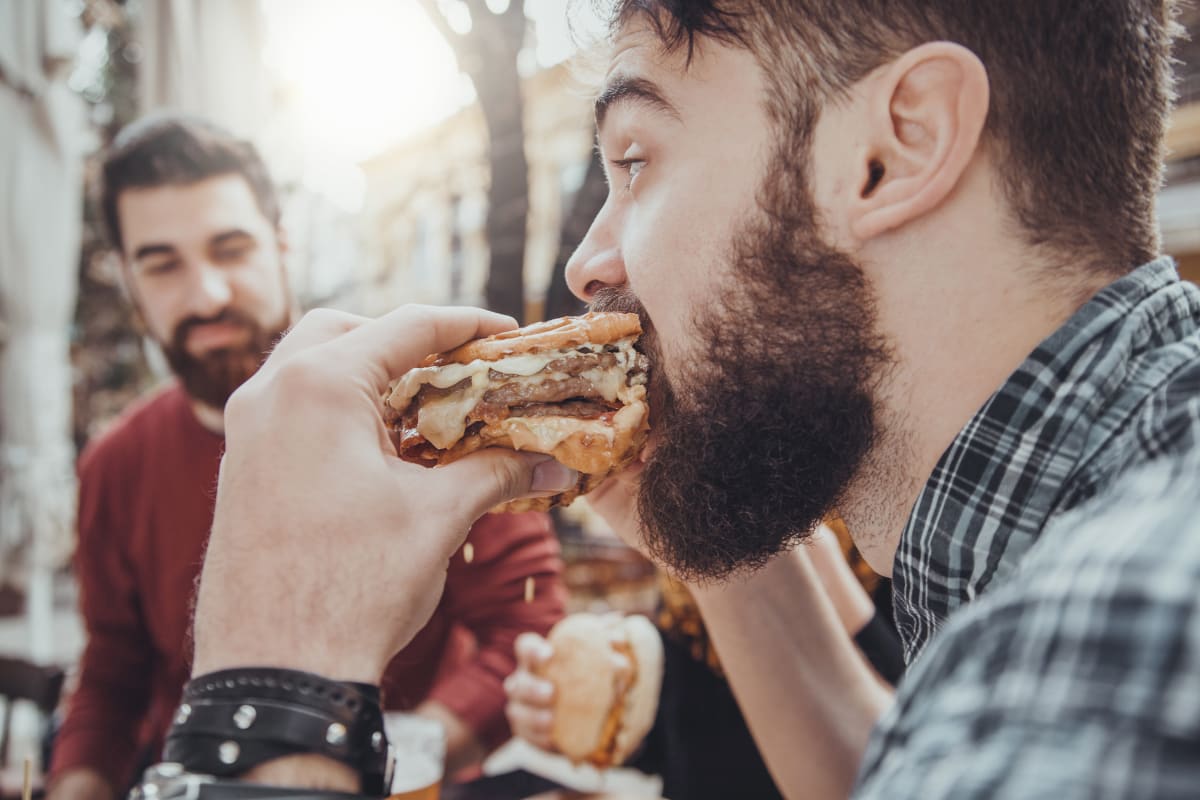 A stag party eating burgers