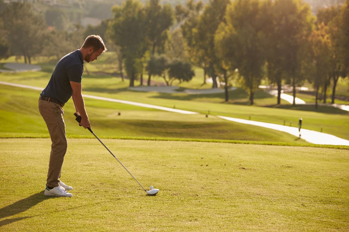 Stag party playing golf on golf course