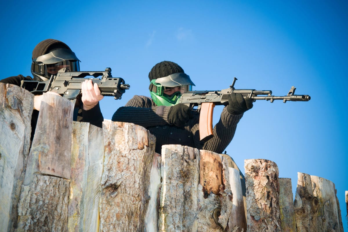 two men on a stag do play airsoft