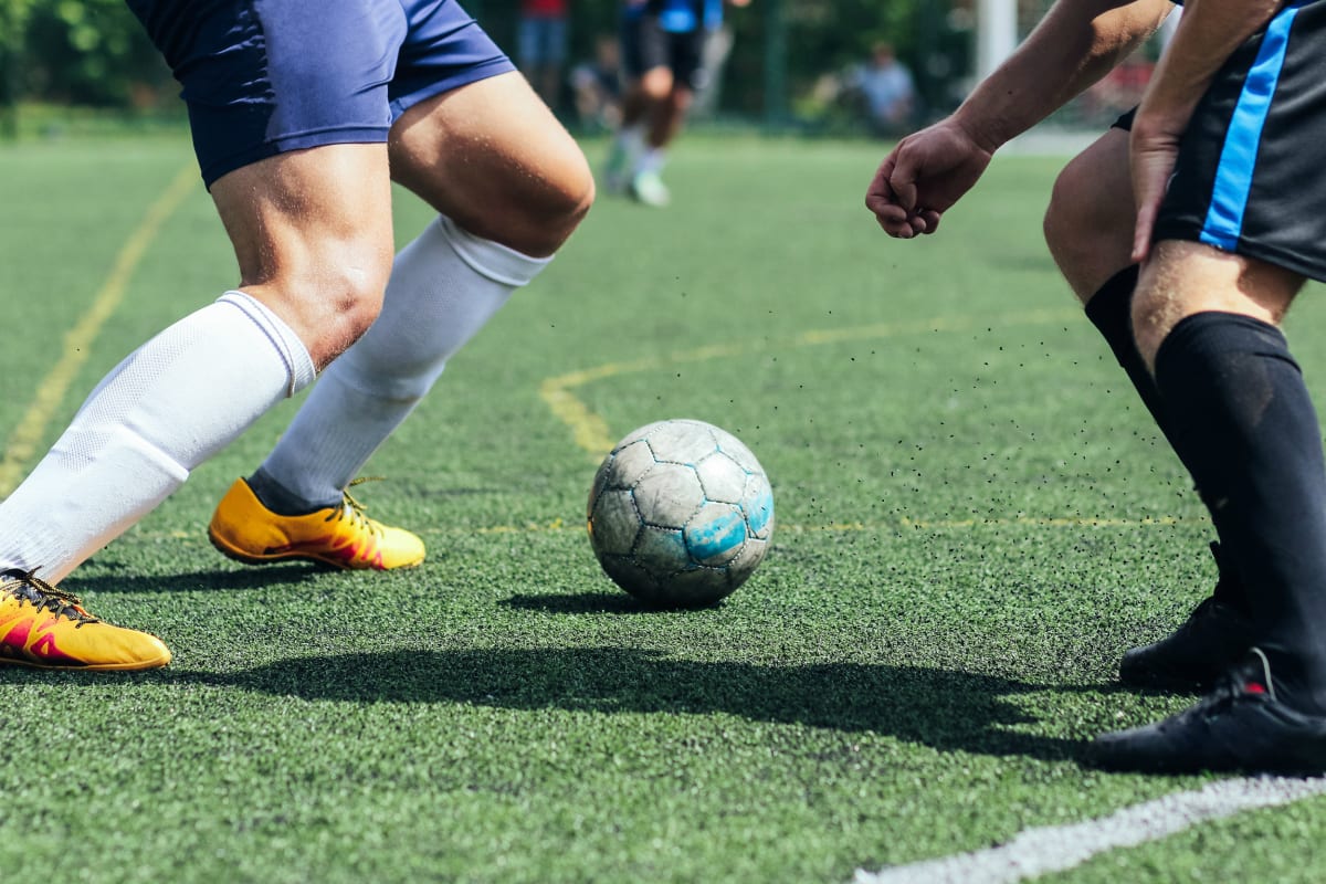 A group of men playing football