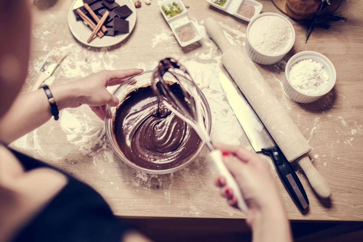 A woman making some delicious chocolate