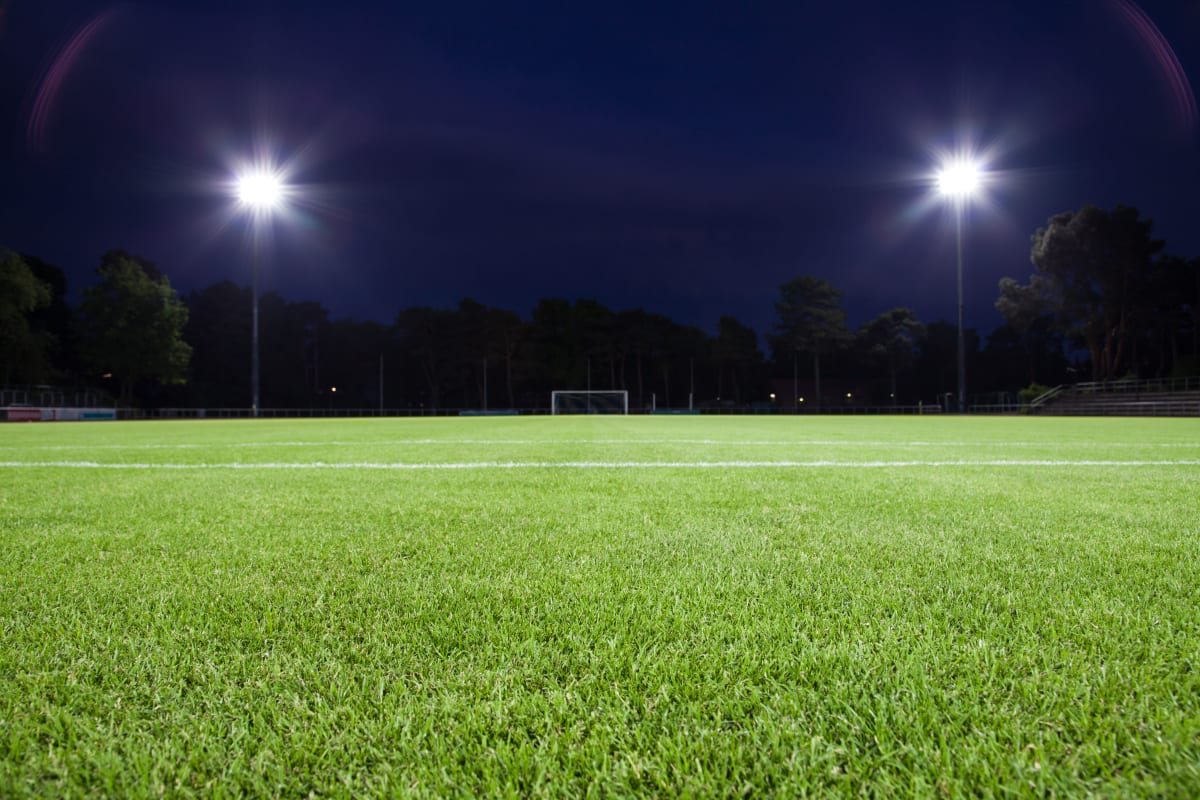 Football field at night with spotlights