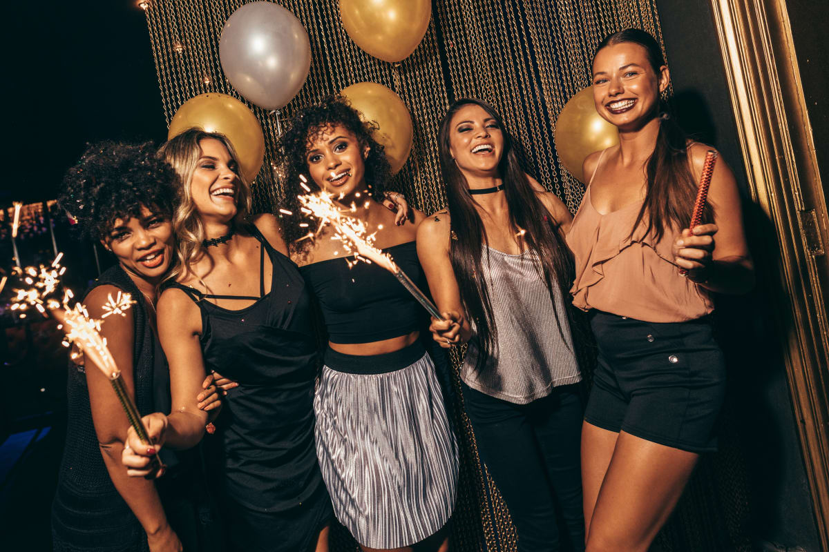 group of women in nightclub VIP theme