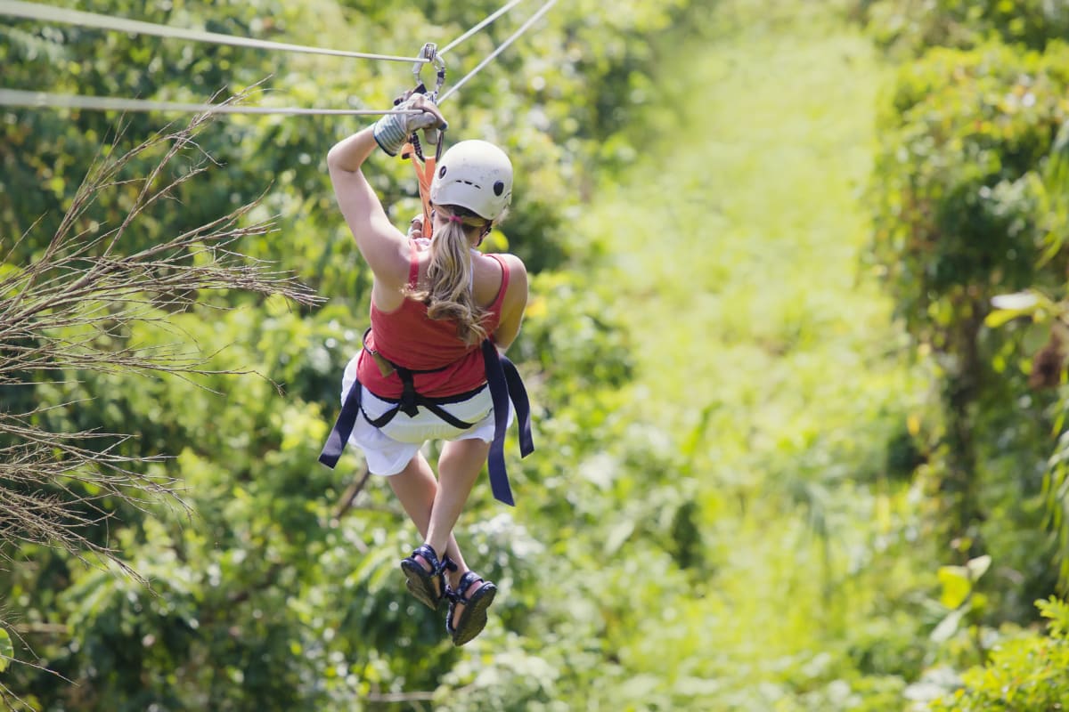 women on zip line