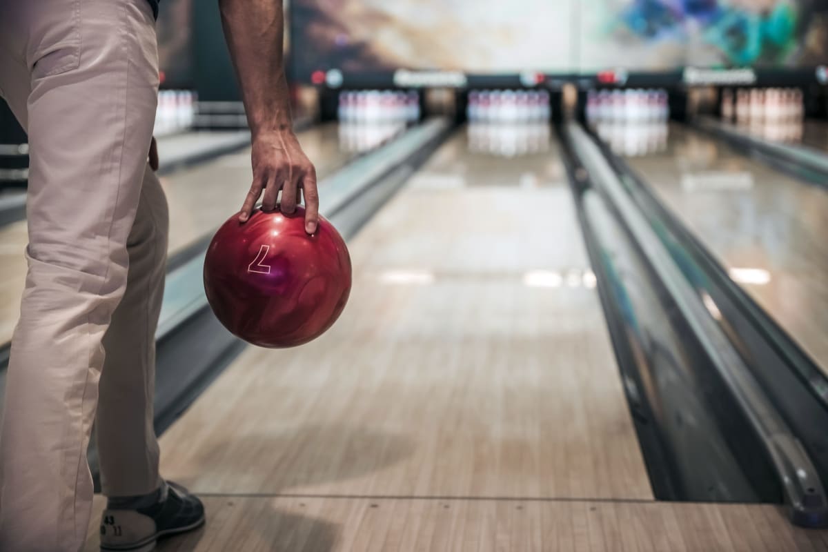 man at bowling alley