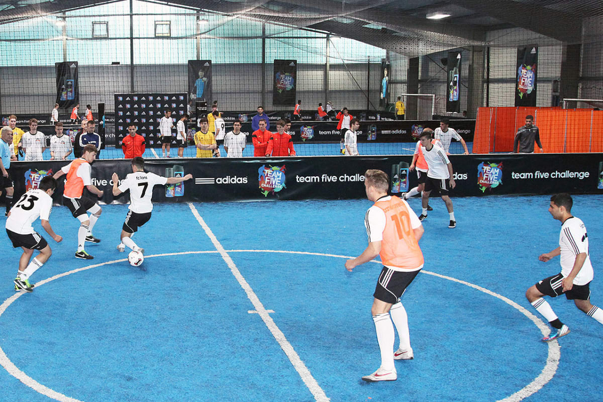 group of men playing five aside football