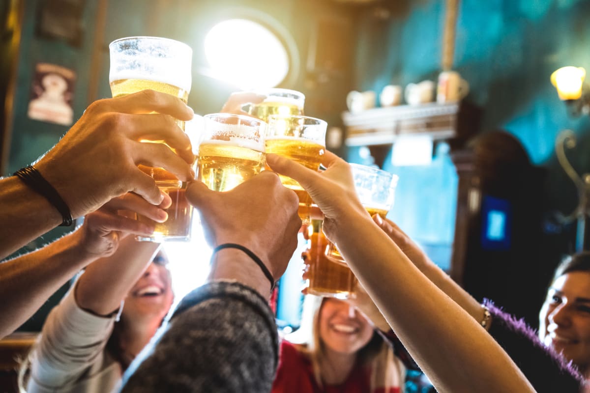 Friends drinking in pub