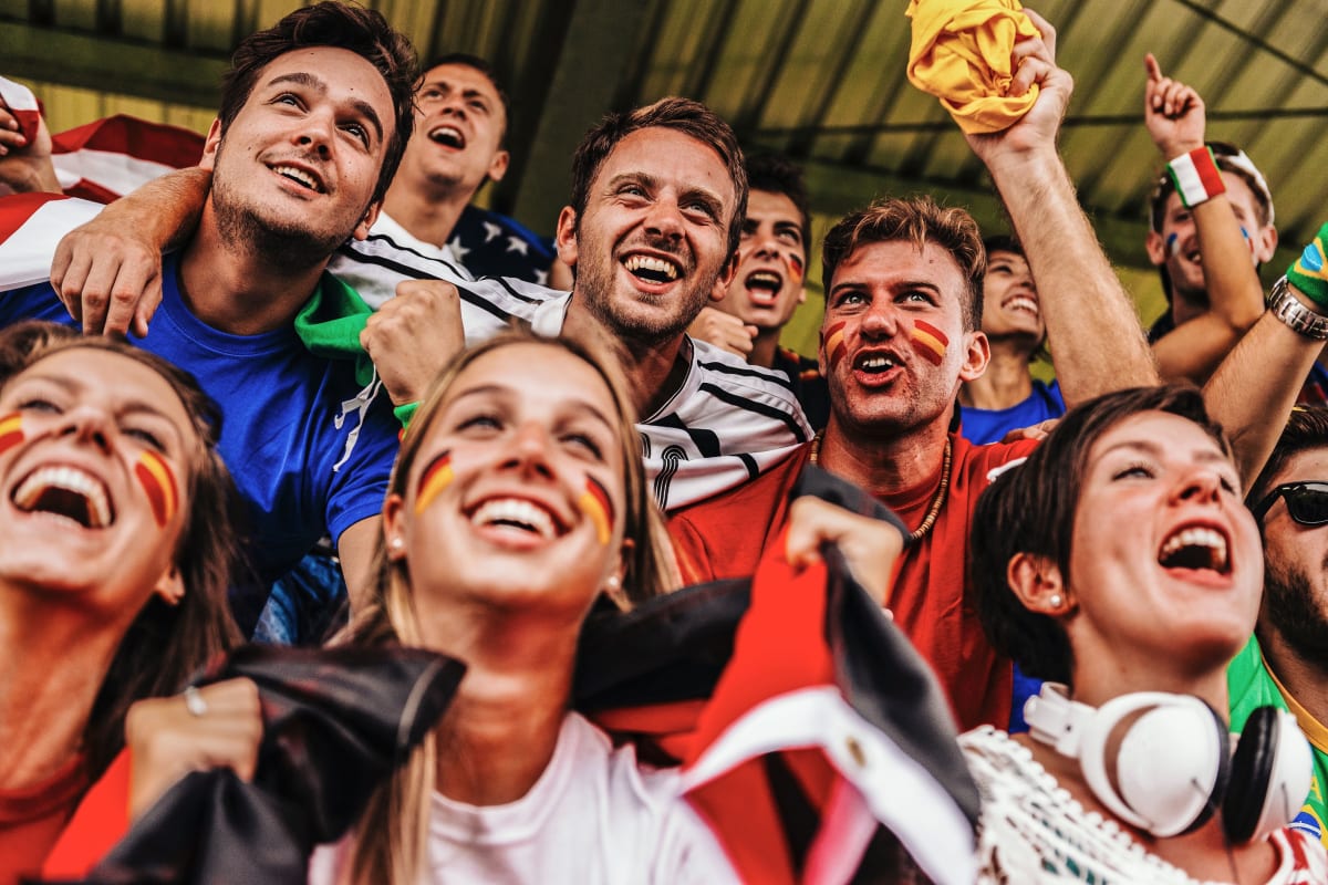 friends at football match