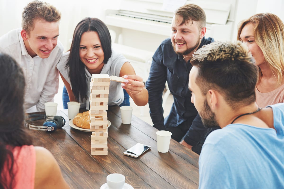 friends playing wooden block game