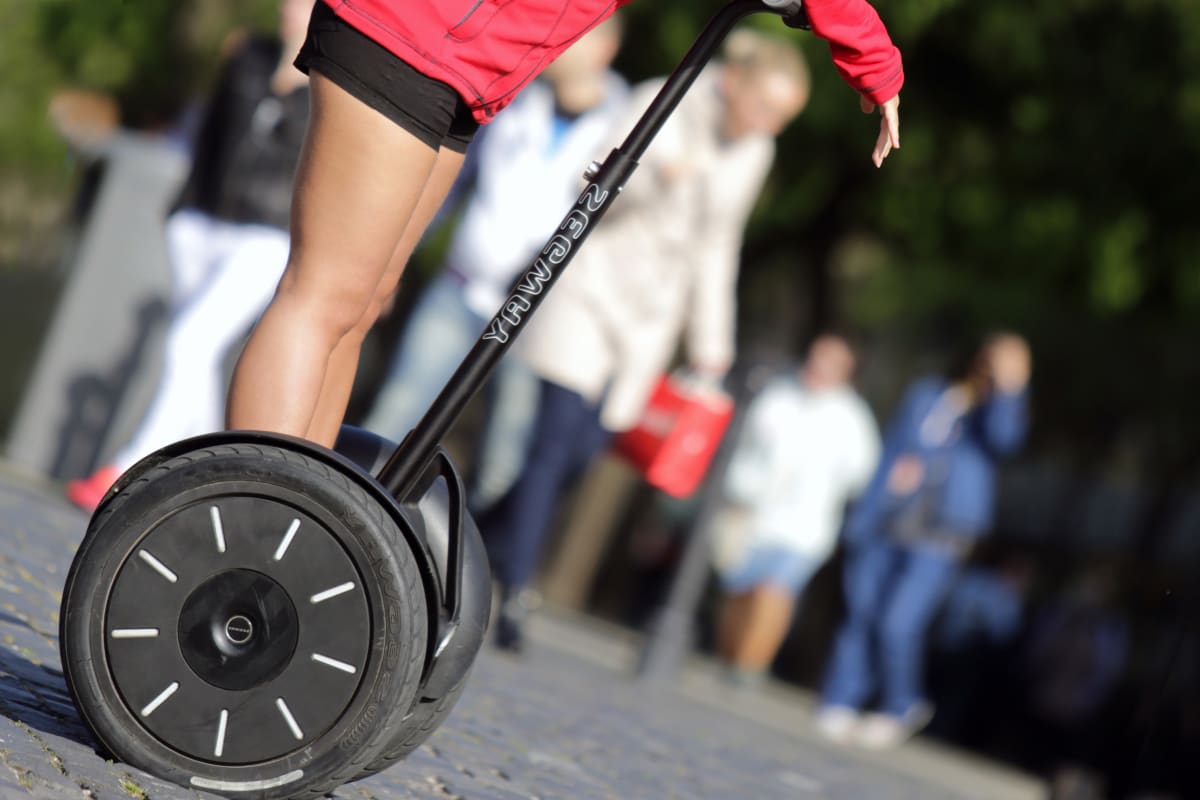 a woman on a segway