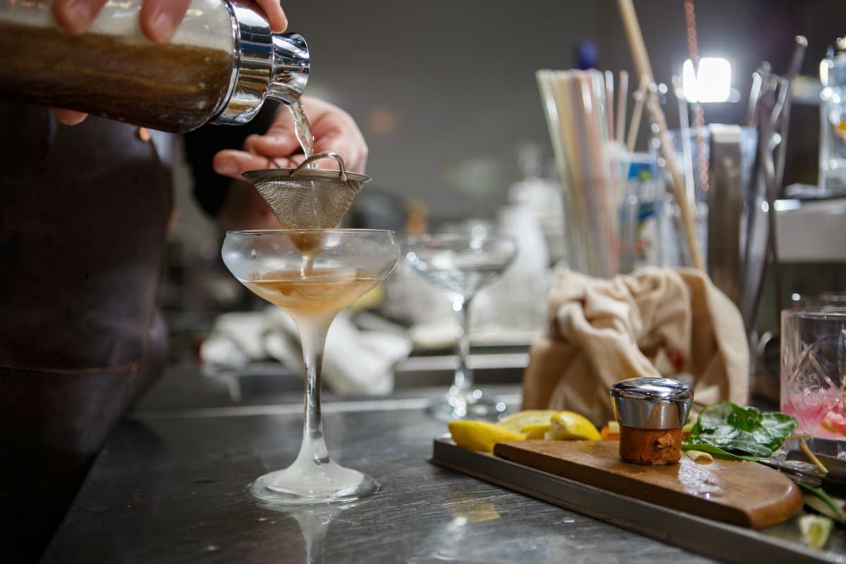 A group enjoying cocktail making