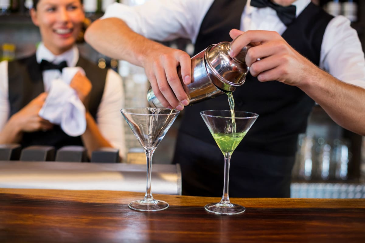 A group enjoying cocktail making