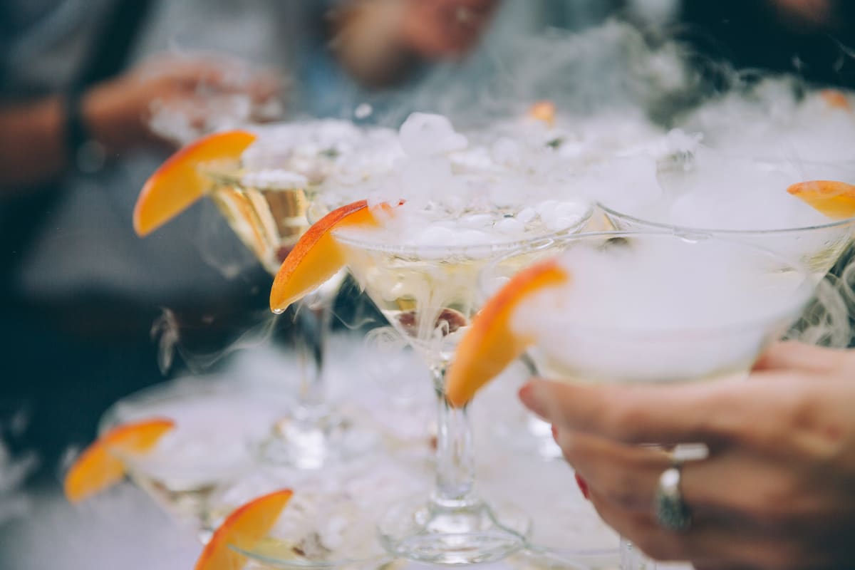 A group of people drinking in the ice bar