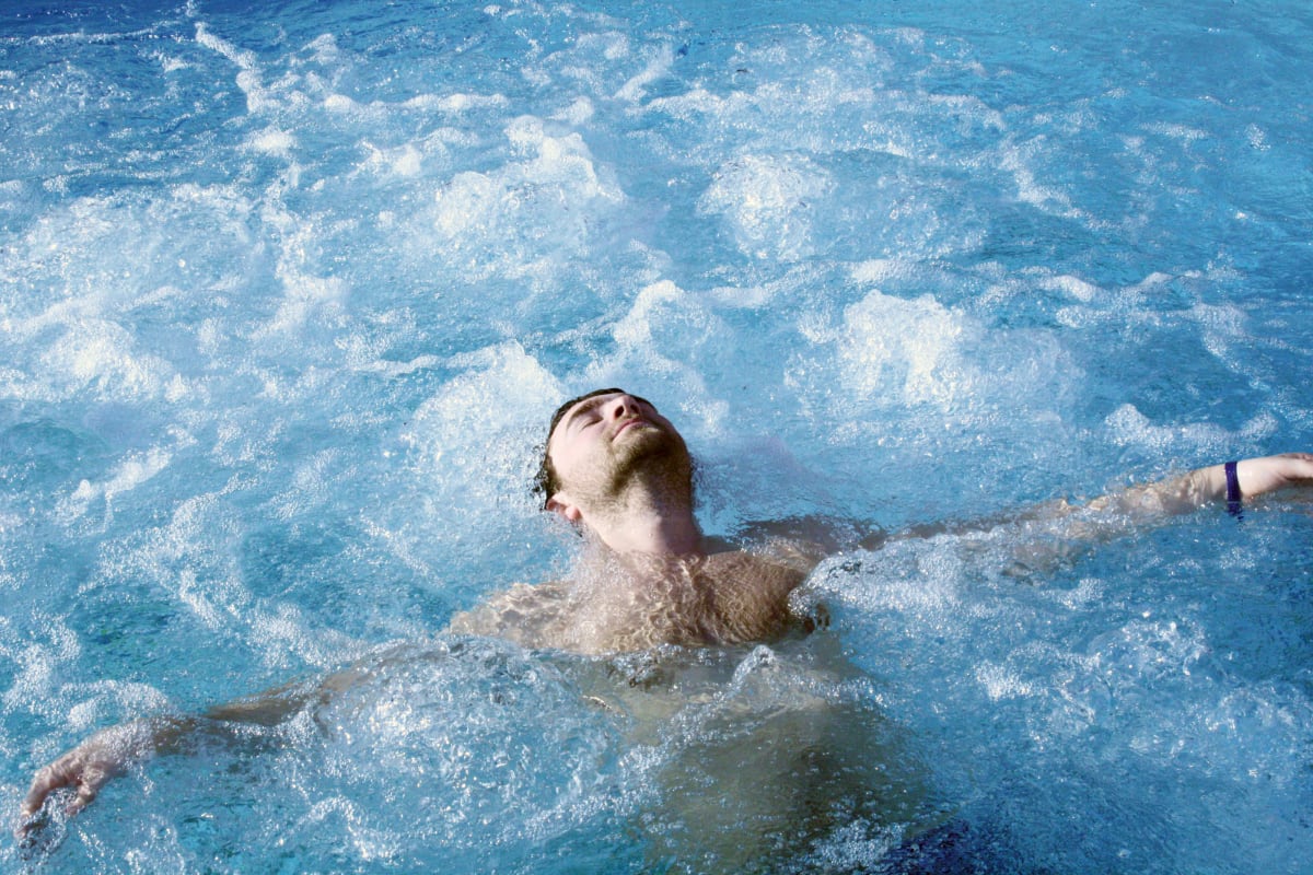 A man relaxing in a spa