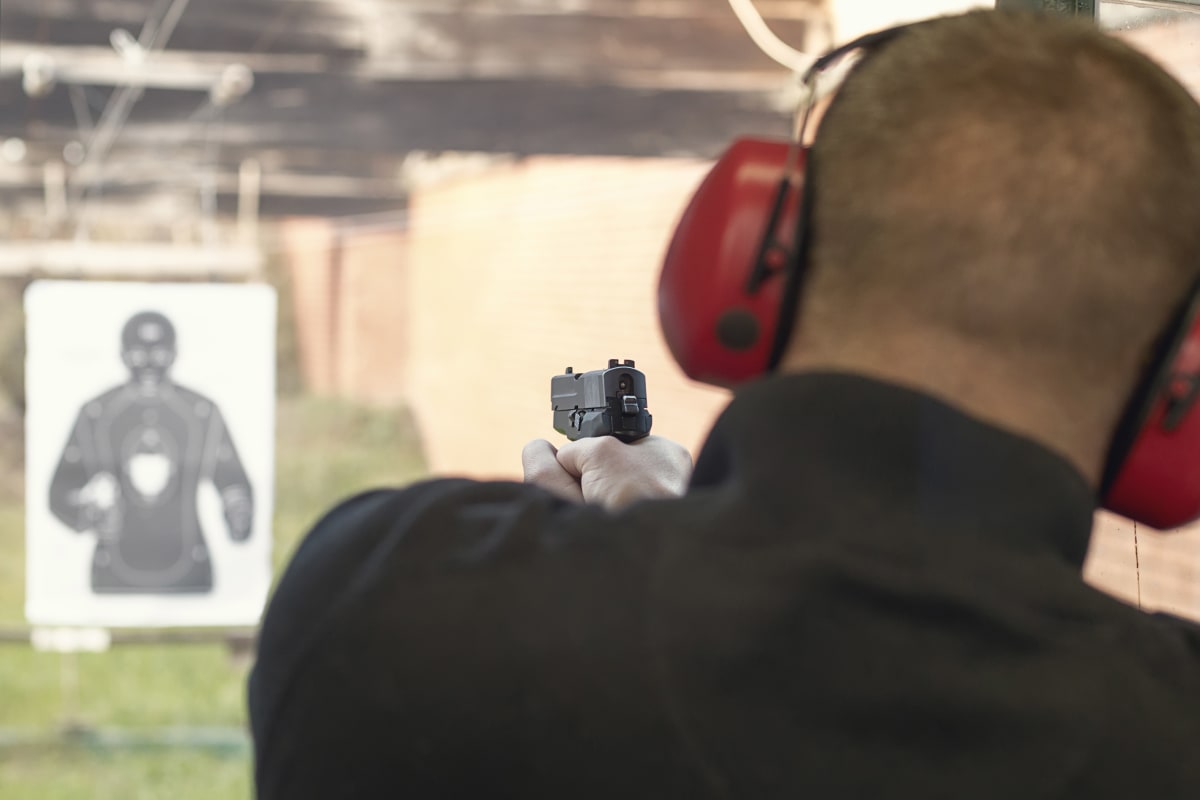 A man at a shooting range