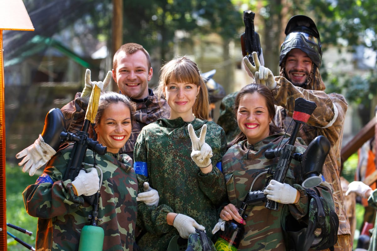 A hen party having fun paintballing