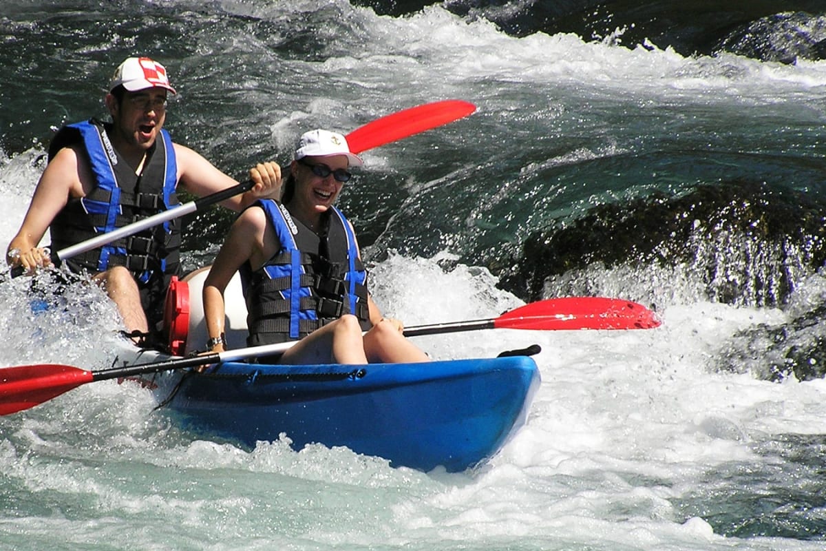 A couple at Mreznica River Kayaking, Huck Finn Adventure Travel