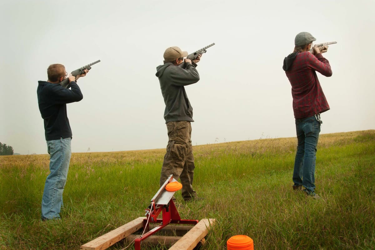 group of guys clay pigeon shooting