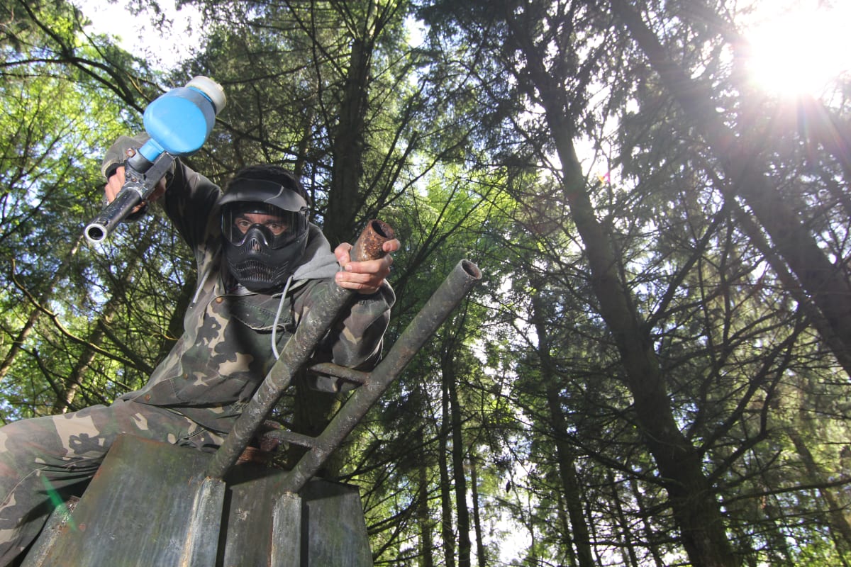 A man playing paintball