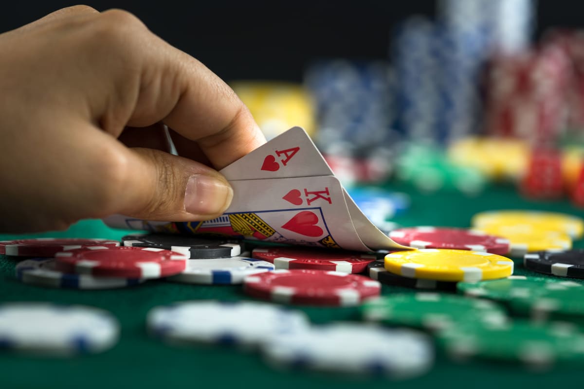 People playing blackjack at the casino table