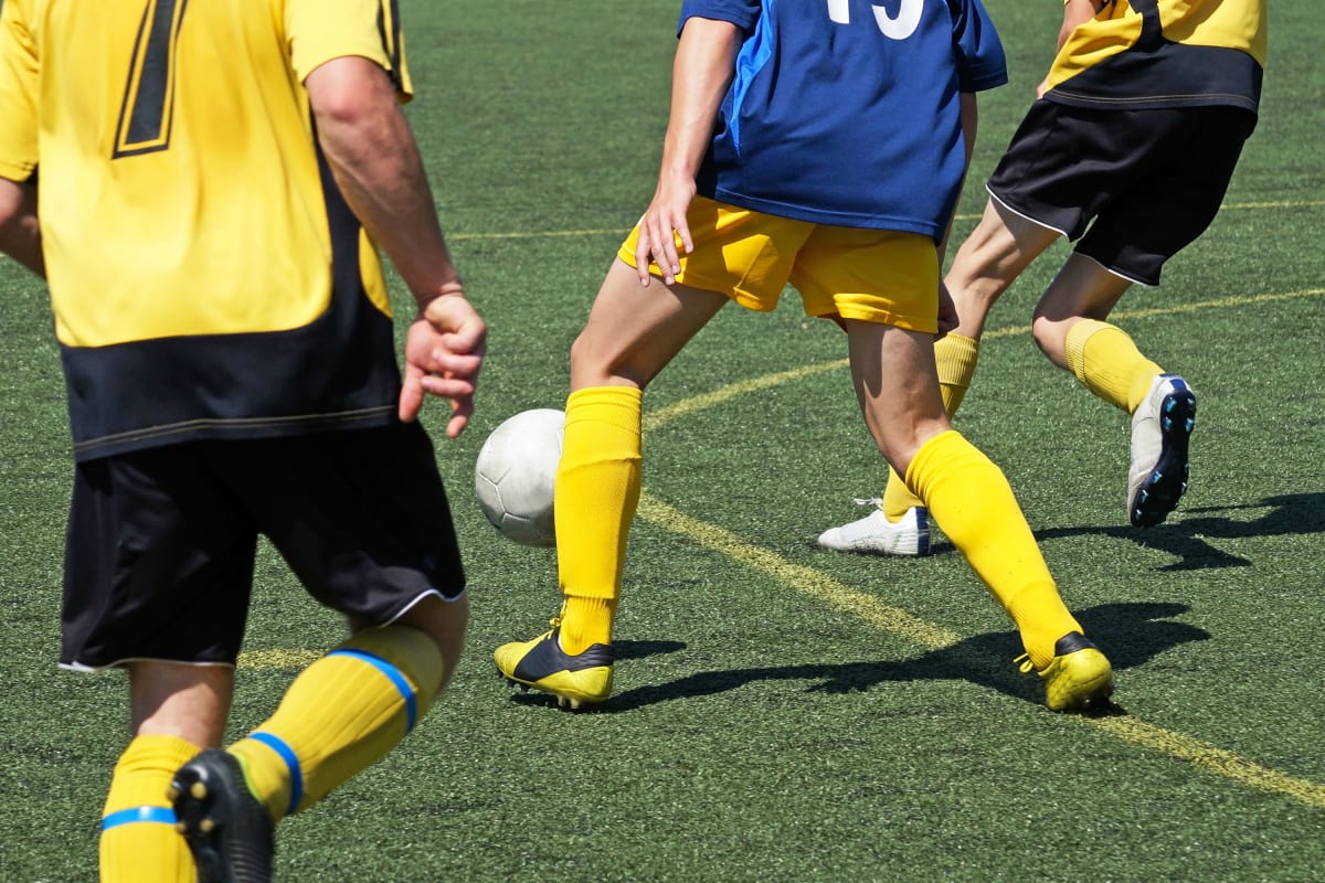 A group of men playing football