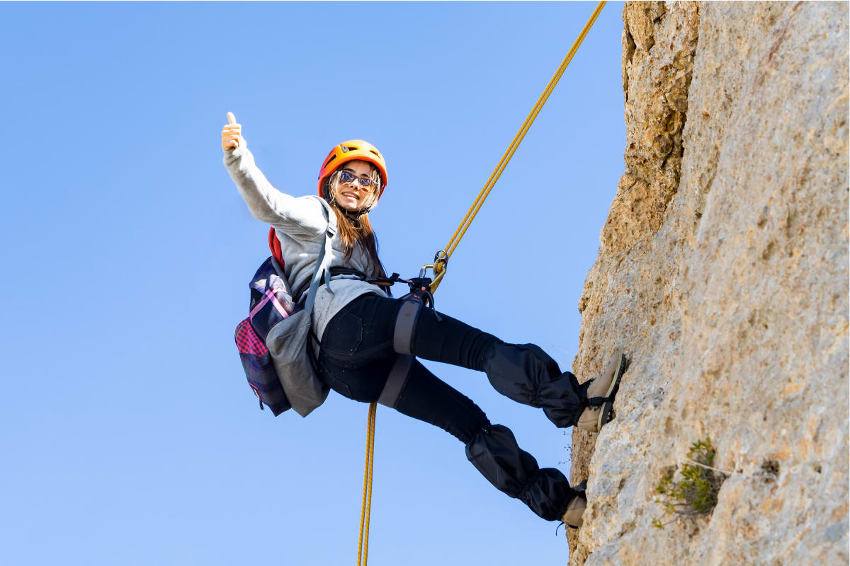 A woman abseiling