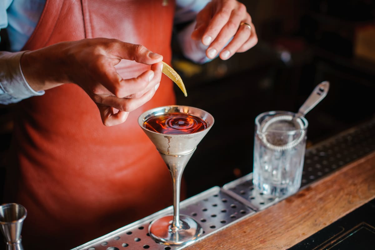 A group enjoying cocktail making