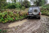 4x4 driving through the mud