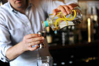 A Man Making a Cocktail
