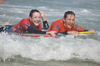 Two girls doing bodyboarding