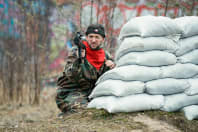 A man enjoying a game of laser tag