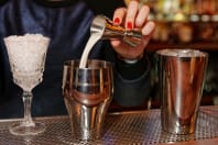 A group enjoying cocktail making