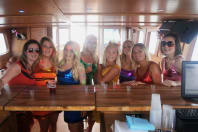 A hen group having fun on a boat party
