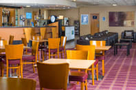 Holiday Inn Express Newcastle Metro bar and food area