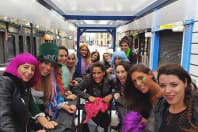 a happy hen party having fun on a pedibus