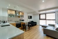 The Print Works Apartments Liverpool Kitchen Dining Area Sofa TV