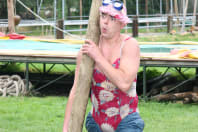 Highland Games funny stag log throwing
