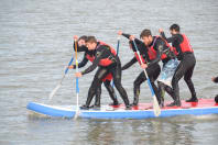 A group of stags paddleboarding