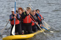 Hen group on a jumbo paddleboard