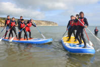A stag group paddleboarding