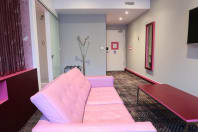 Citrus Hotel Cheltenham pink room facilities living area