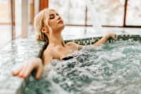 woman in spa enjoying pool