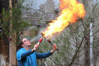 A woman on a hen party breathes fire