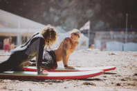 A man taking a surfing lesson