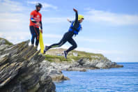 A girl doingcoasteering